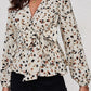 Printed Tie Front Plunge Peplum Blouse